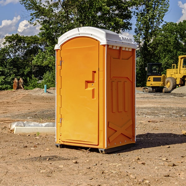 how often are the portable restrooms cleaned and serviced during a rental period in Tunica County